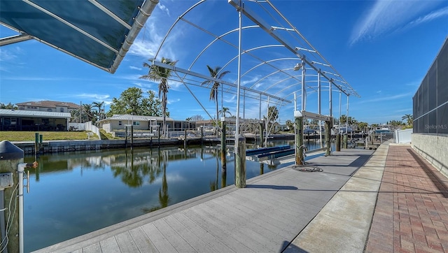 dock area with a water view