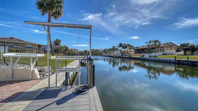 dock area featuring a water view