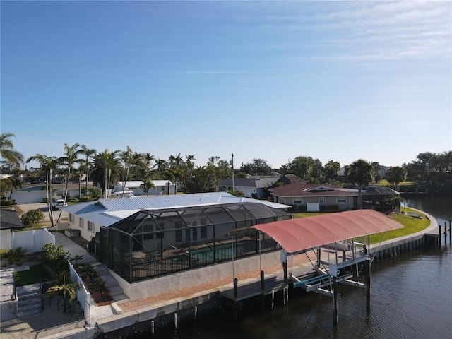 dock area featuring a water view and a lanai