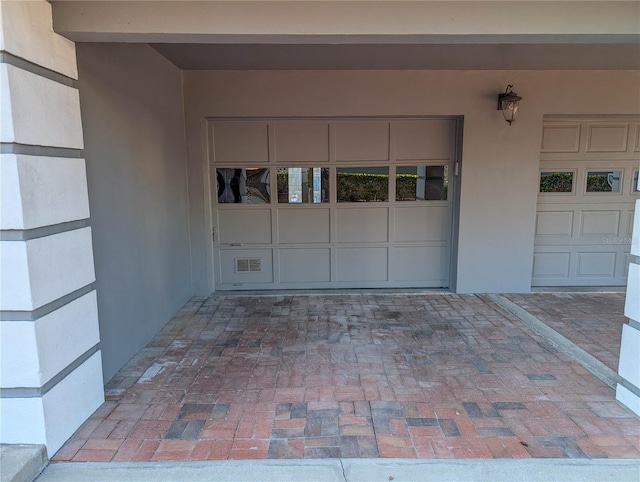 property entrance featuring a garage