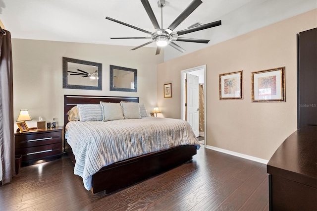 bedroom with ceiling fan, dark hardwood / wood-style floors, and vaulted ceiling