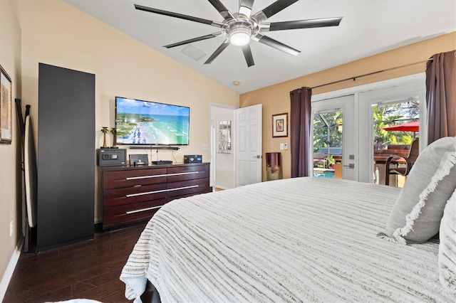 bedroom featuring ceiling fan, dark hardwood / wood-style flooring, access to exterior, and lofted ceiling