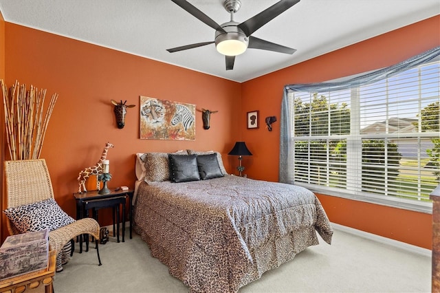 bedroom with carpet and ceiling fan