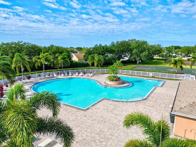 view of swimming pool featuring a patio