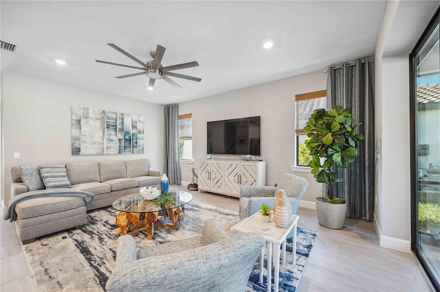 living room featuring ceiling fan