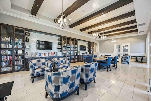 living room featuring beamed ceiling, ornamental molding, tile patterned floors, and an inviting chandelier