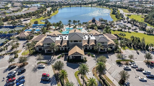 birds eye view of property featuring a water view