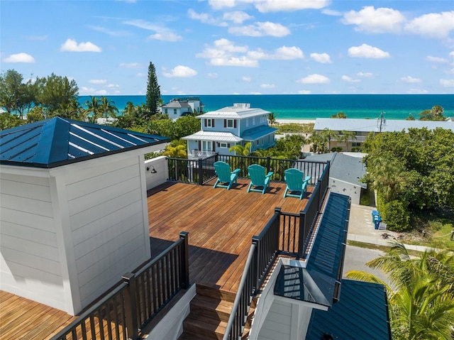 wooden deck with a water view