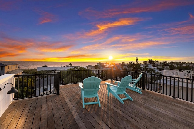 deck at dusk with a water view