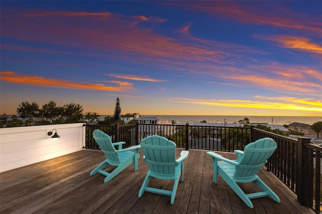 deck at dusk with a water view