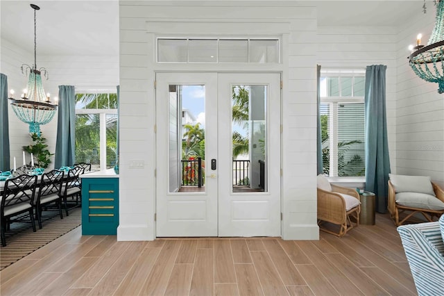 doorway featuring a chandelier