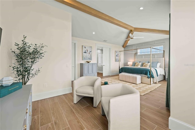 bedroom featuring vaulted ceiling with beams