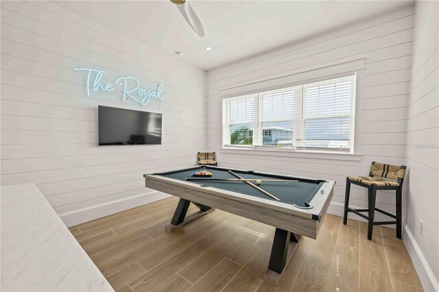 rec room with ceiling fan, light hardwood / wood-style floors, and billiards