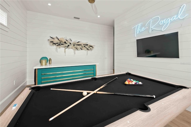 playroom featuring wood walls, hardwood / wood-style floors, and billiards