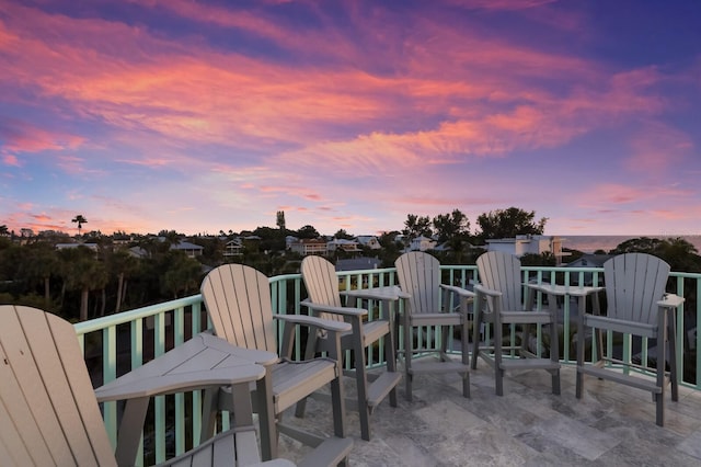 view of patio terrace at dusk