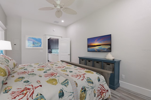 bedroom with light wood-type flooring and ceiling fan