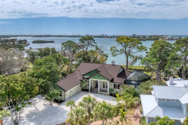 drone / aerial view with a water view