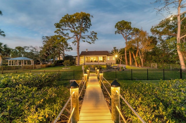 dock area with a lawn