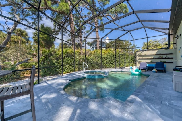 view of swimming pool featuring an in ground hot tub, a lanai, and a patio area