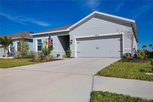 ranch-style home featuring a garage