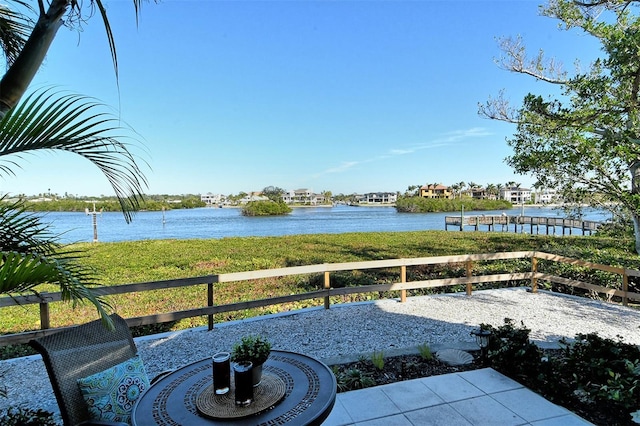 view of patio / terrace featuring a water view