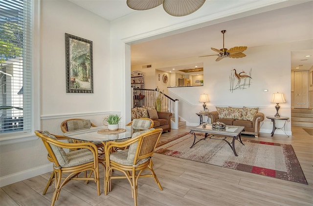 dining space featuring ceiling fan