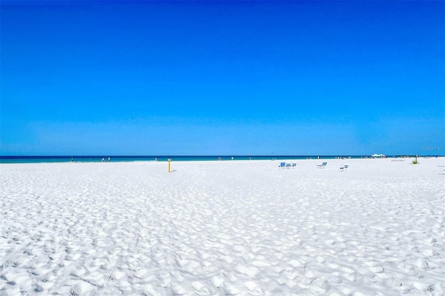 view of water feature with a beach view