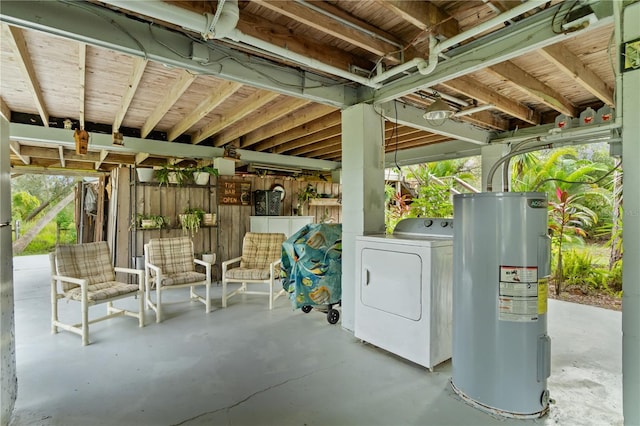 basement featuring washer / dryer and water heater