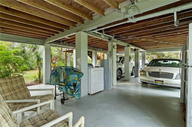 view of patio / terrace with washer / clothes dryer and water heater