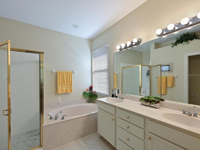 bathroom featuring tile patterned floors, vanity, and separate shower and tub