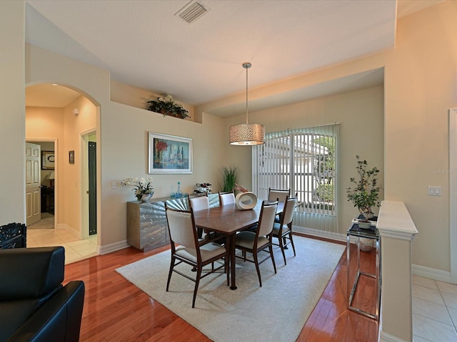 dining space featuring light hardwood / wood-style flooring