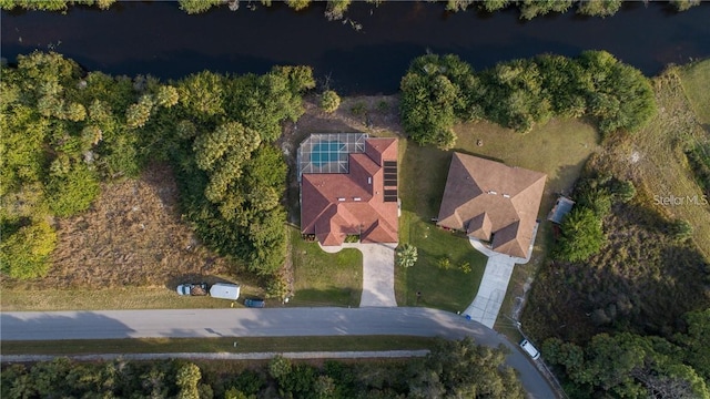 drone / aerial view featuring a water view