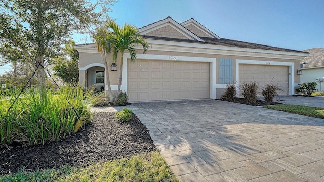 single story home with a garage