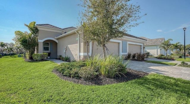 view of home's exterior featuring a garage and a yard