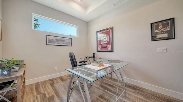 office area with hardwood / wood-style flooring