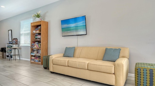 living room featuring light tile patterned floors