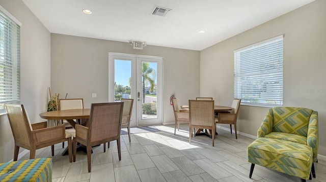 dining area featuring french doors