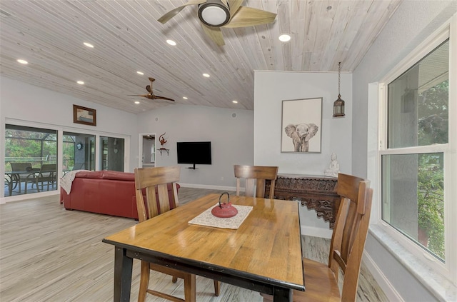 dining space with ceiling fan, light hardwood / wood-style flooring, wood ceiling, and vaulted ceiling