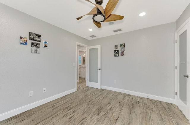 unfurnished bedroom featuring ceiling fan and light hardwood / wood-style floors