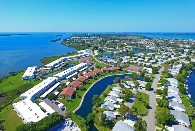 bird's eye view with a water view