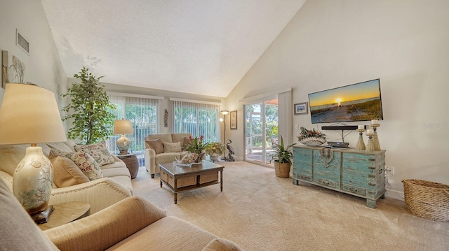 living room featuring light carpet and high vaulted ceiling