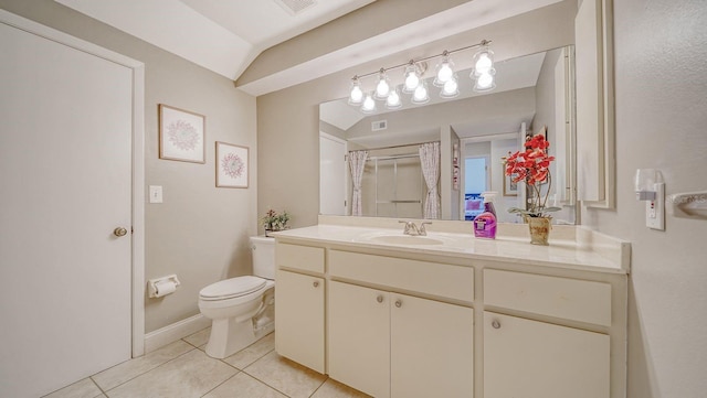 bathroom with vanity, lofted ceiling, a shower with curtain, tile patterned flooring, and toilet