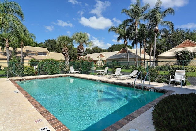 view of swimming pool featuring a patio