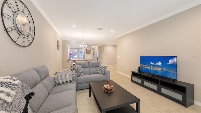 living area featuring light tile patterned floors, baseboards, visible vents, and crown molding