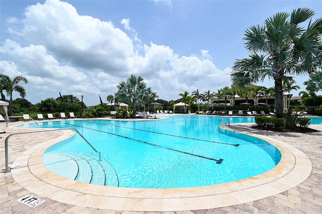 pool with a patio area