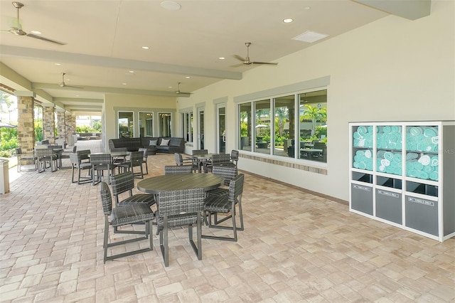 view of patio featuring ceiling fan, outdoor dining area, and outdoor lounge area