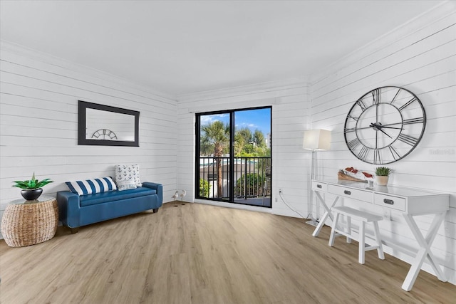 sitting room with light hardwood / wood-style flooring