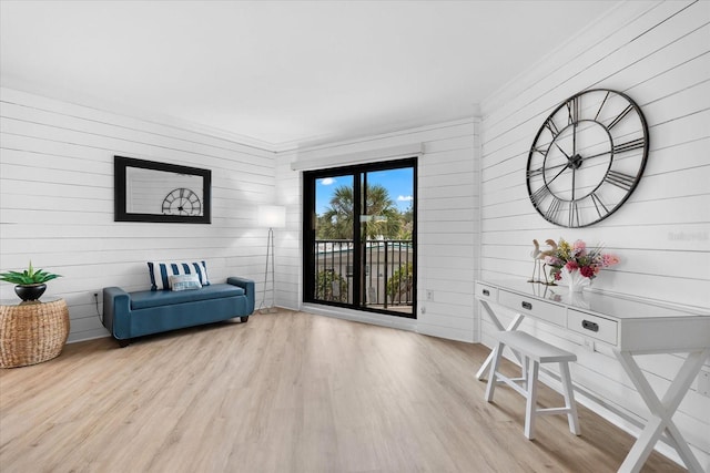 living area with light hardwood / wood-style floors