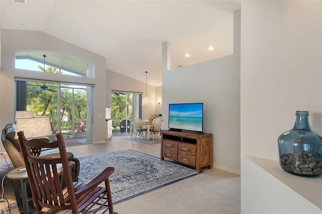 living room featuring light tile patterned floors and lofted ceiling