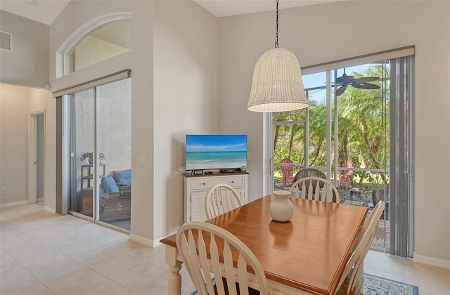 dining space featuring light tile patterned floors